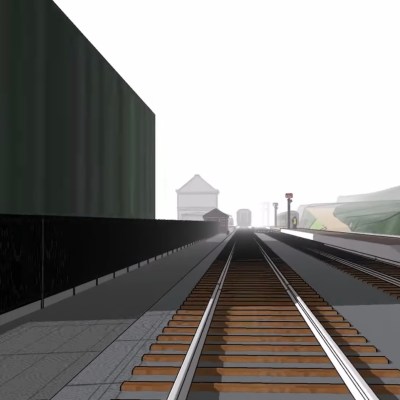3D render of empty railway tracks with signals and fences on both sides.