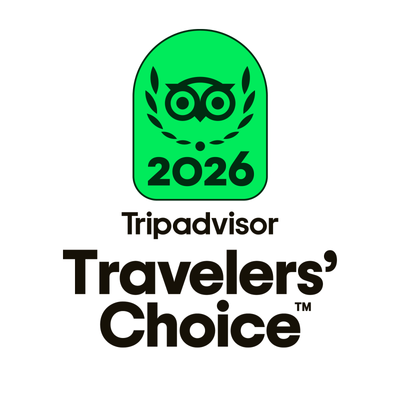 Green badge: 2026 TripAdvisor Travelers' Choice with owl logo.